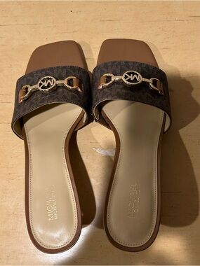 Michael Michael Kors signature slip on  kitten heeled slide mules in size 7.5